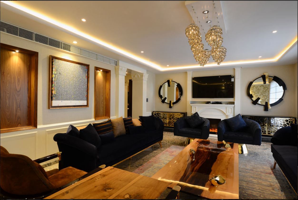 Formal living room with crystal chandeliers and live-edge coffee table